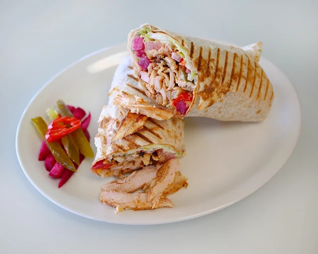 Fresh hummus and Middle Eastern sides at Empire Shawarma Calgary NW